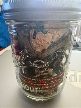Jewelry in Wide Mouth Ball Mason Jar Full of Jewelry